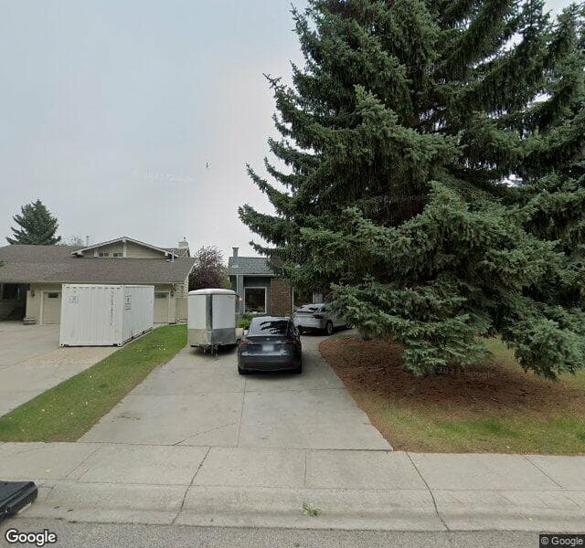Street view of 640 Lake Moraine Way SE, Calgary