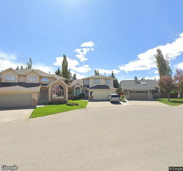 Street view of 220 Mount Sparrowhawk Place SE, Calgary