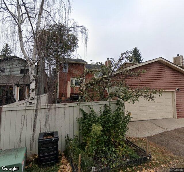 Street view of 724 Coach Bluff Crescent SW, Calgary