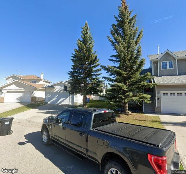 Street view of 76 Hawktree Close NW, Calgary