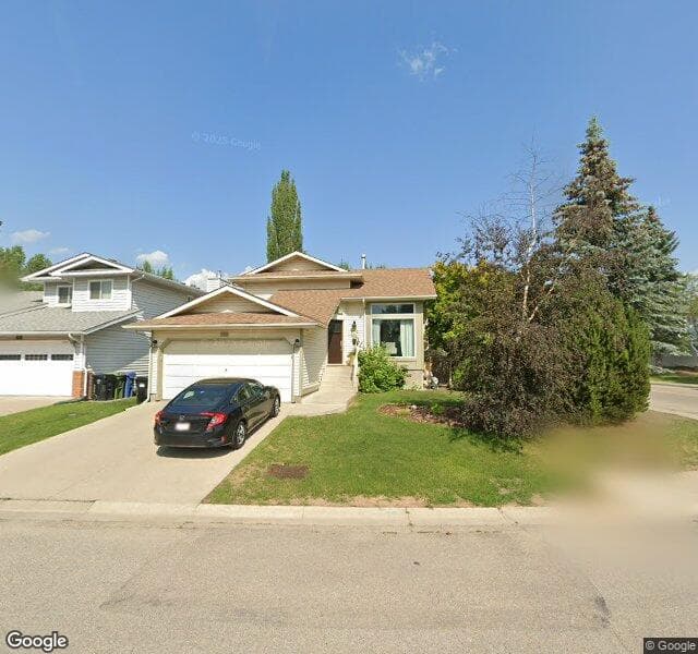 Street view of 64 Riverglen Road SE, Calgary