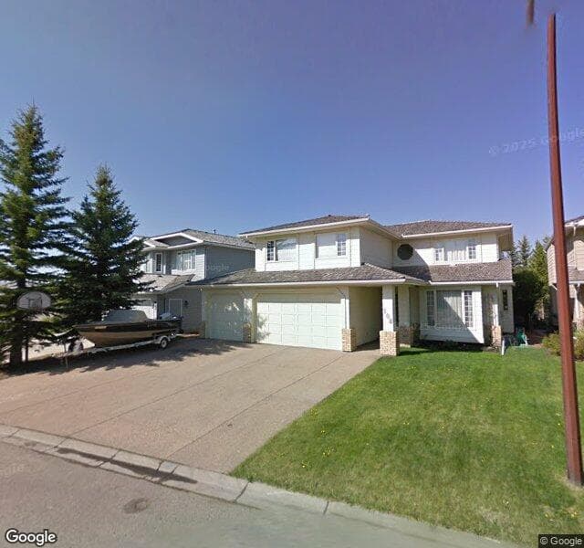 Street view of 108 Sunset Close SE, Calgary