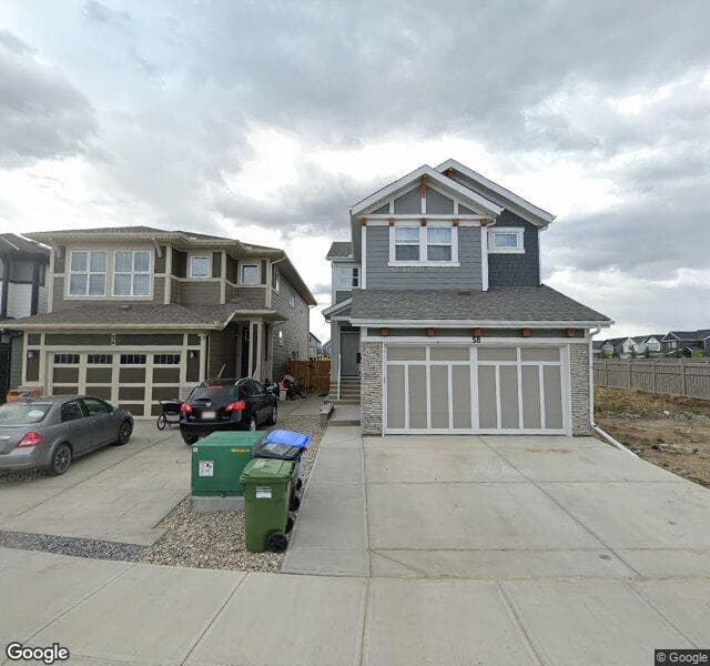 Street view of 58 Magnolia Path SE, Calgary