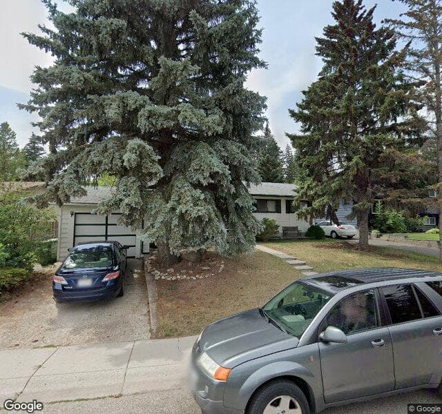 Street view of 48 Lake Huron Place SE, Calgary