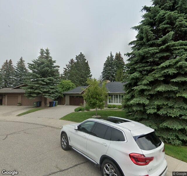 Street view of 544 Lake Moraine Green SE, Calgary