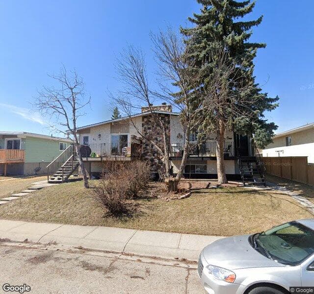 Street view of 64 Queen Alexandra Close SE, Calgary