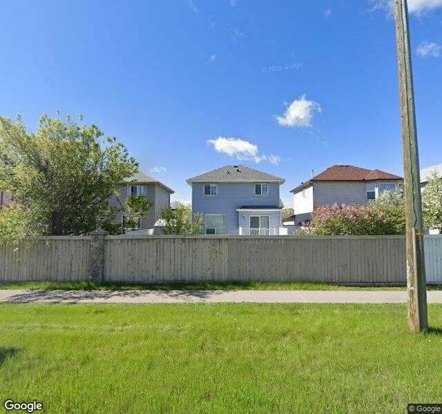Street view of 99 Somerside Common SW, Calgary