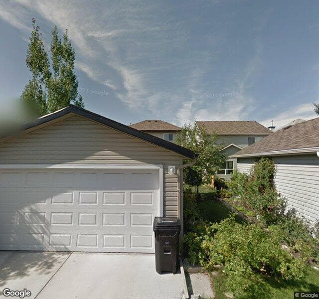 Street view of 1048 Prestwick Circle SE, Calgary