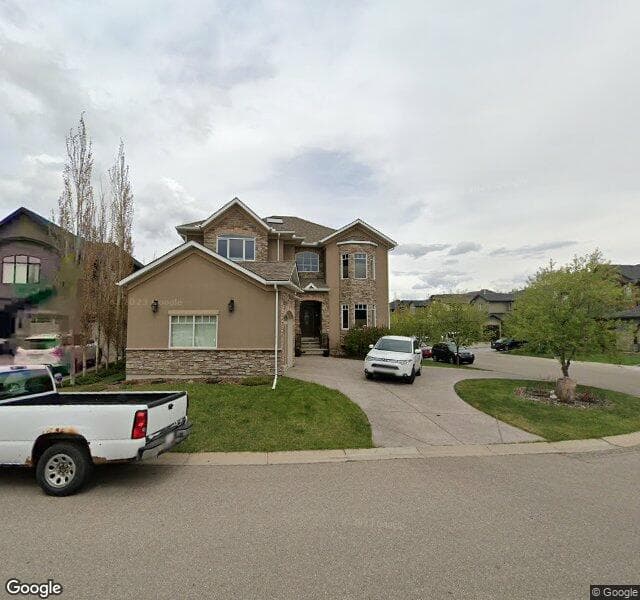 Street view of 84 Rockcliff Point NW, Calgary