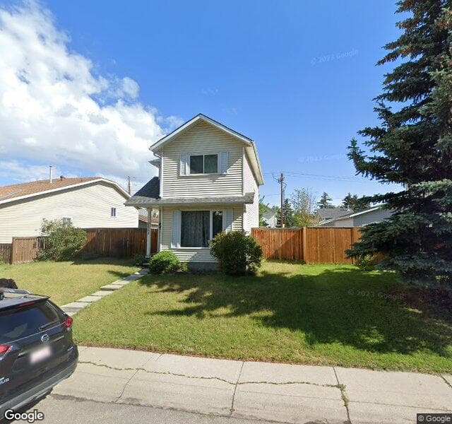Street view of 7052 15 Avenue SE, Calgary