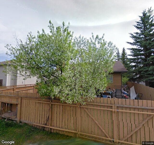 Street view of 209 Woodford Drive SW, Calgary