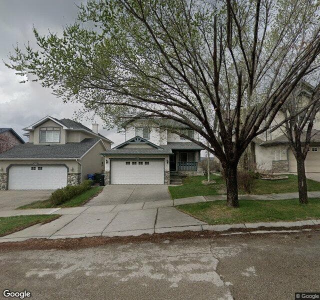 Street view of 225 Hidden Creek Boulevard NW, Calgary