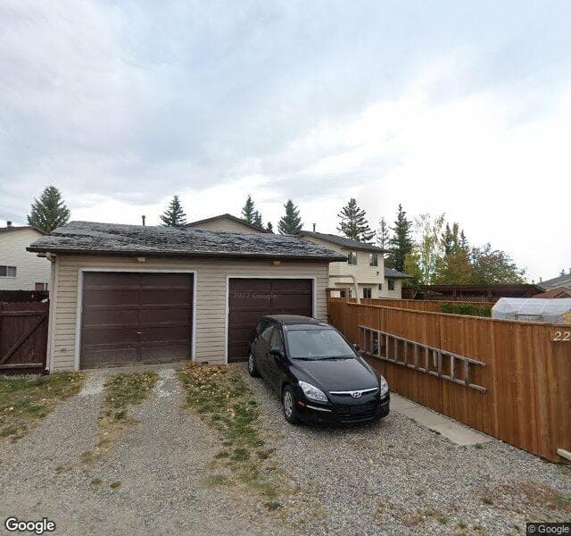 Street view of 228 Cedarbrook Bay SW, Calgary