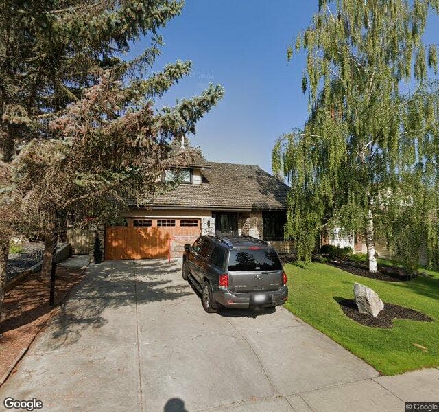 Street view of 100 Oakmount Way SW, Calgary