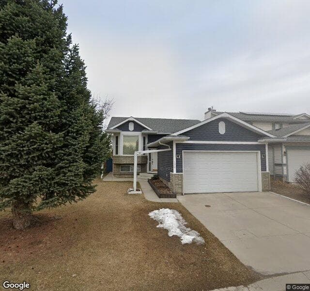 Street view of 176 Riverstone Crescent SE, Calgary