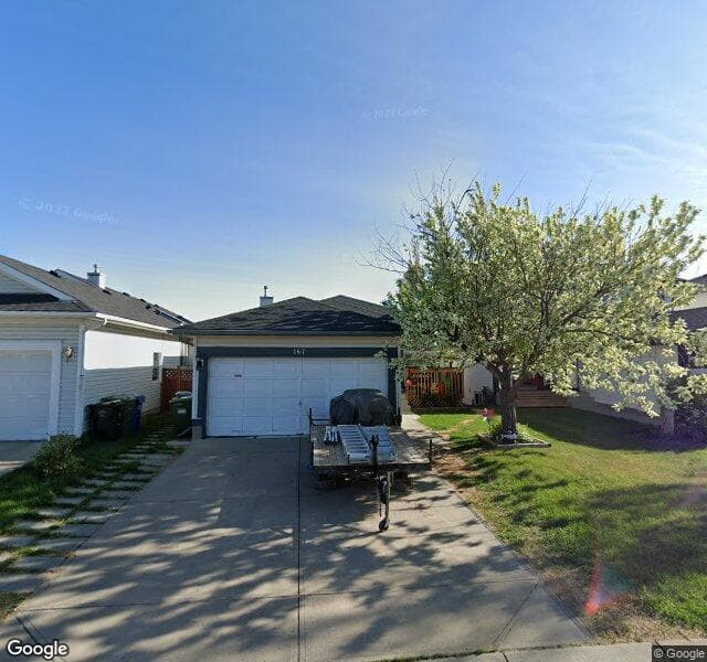 Street view of 167 Hidden Spring Close NW, Calgary