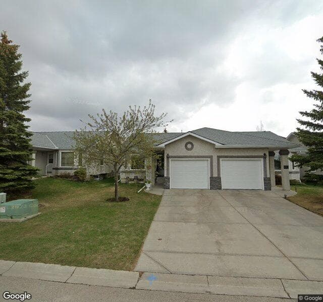 Street view of 217 Arbour Cliff Close NW, Calgary