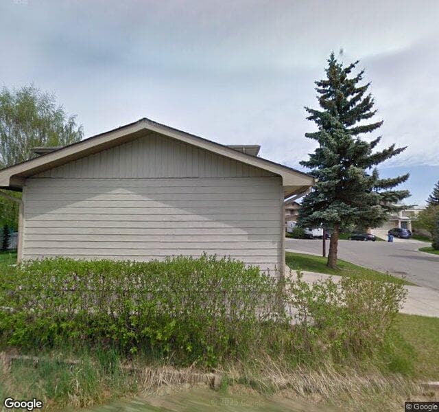 Street view of 472 Woodglen Place SW, Calgary