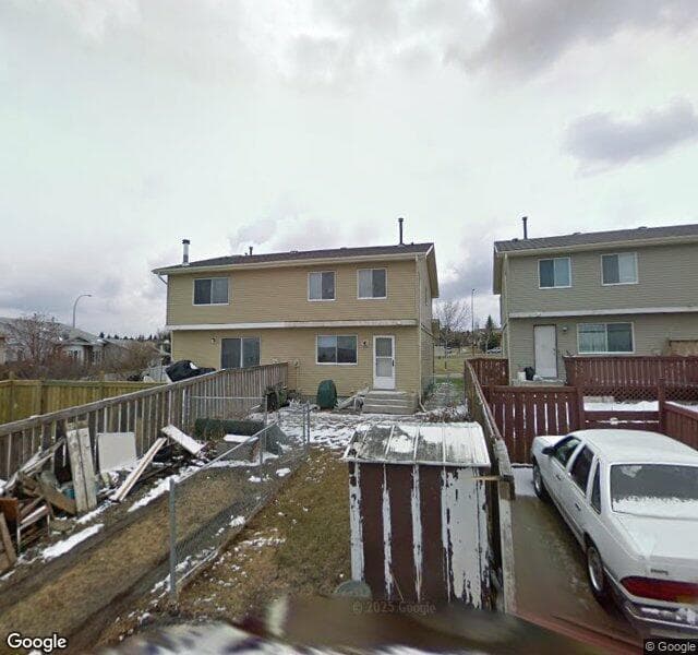 Street view of 92 Sandarac Way NW, Calgary