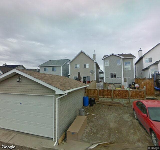 Street view of 64 Tuscany Springs Way NW, Calgary