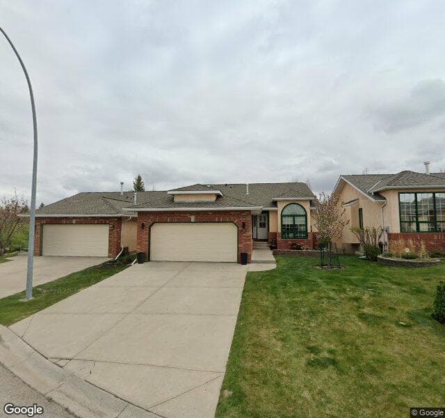 Street view of 67 Evergreen Grove SW, Calgary