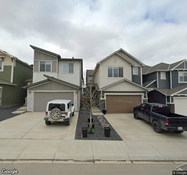 Street view of 878 Bluerock Way SW, Calgary