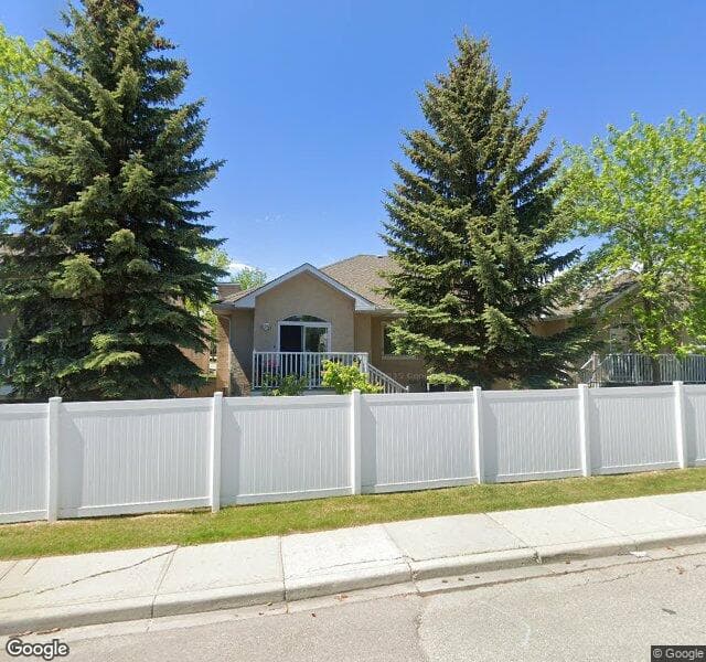 Street view of 46 Harvest Lake Villas NE, Calgary