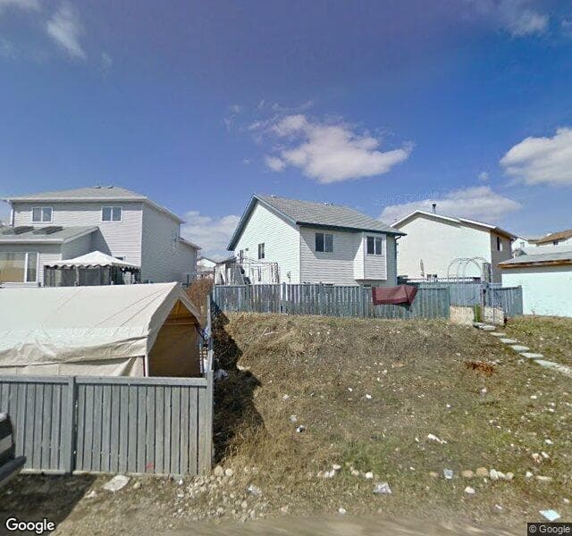 Street view of 20 Harvest Gold Heights NE, Calgary