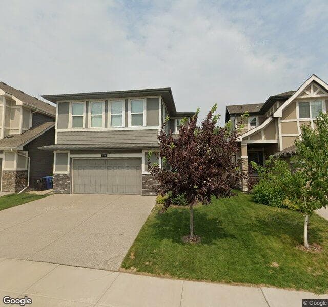 Street view of 104 Cranbrook Way SE, Calgary