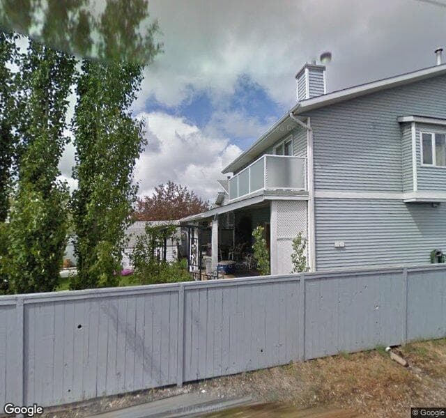 Street view of 52 Riverglen Way SE, Calgary