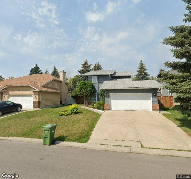 Street view of 15 Woodmont Crescent SW, Calgary