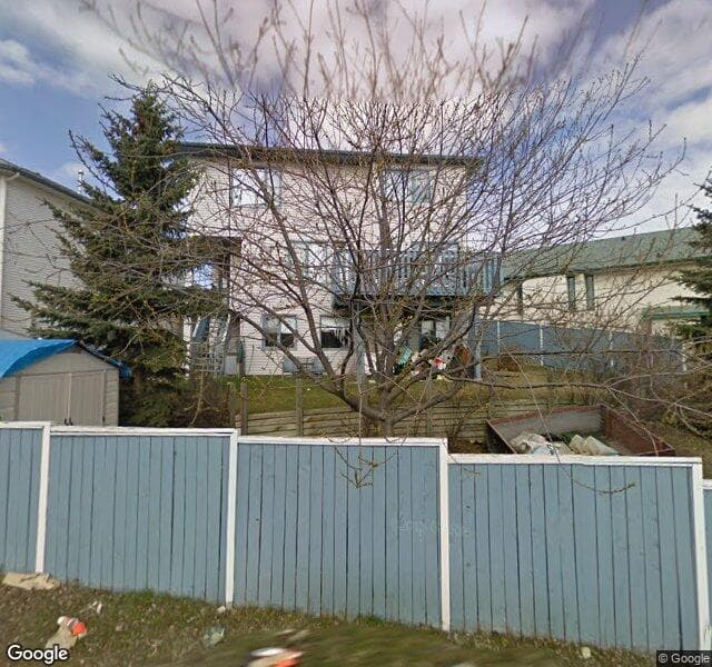 Street view of 24 Harvest Glen Mews NE, Calgary
