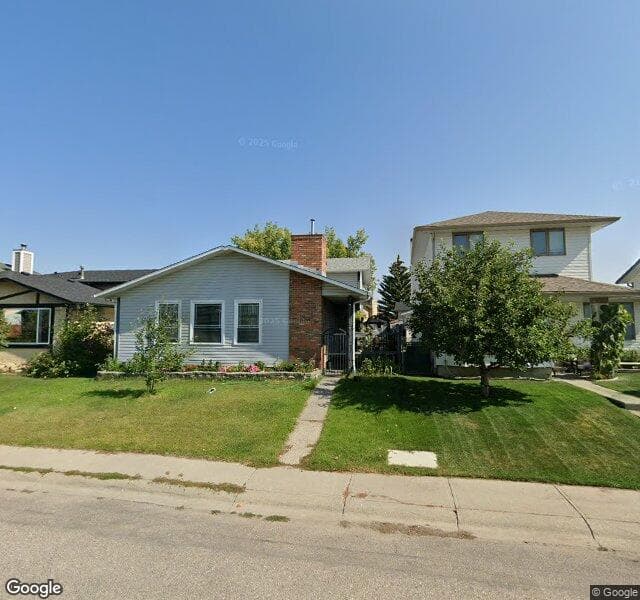 Street view of 215 Shawcliffe Circle SW, Calgary
