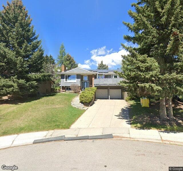 Street view of 232 Edgemont Bay NW, Calgary