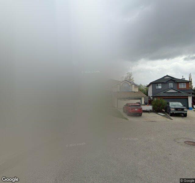 Street view of 323 Bridlecreek Green SW, Calgary