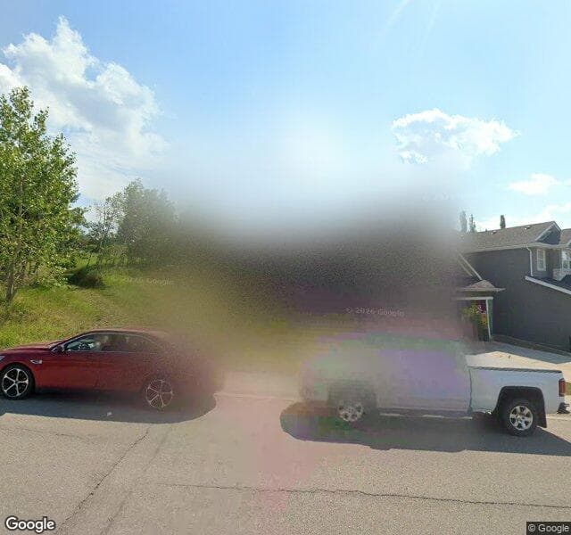 Street view of 213 Springbluff Boulevard SW, Calgary