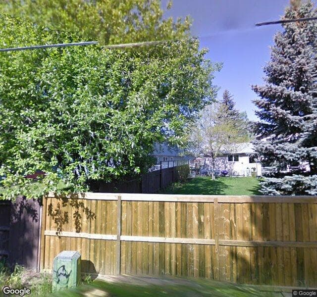 Street view of 132 Lake Moraine Place SE, Calgary