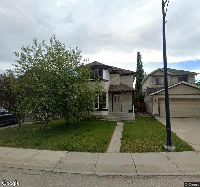 Street view of 203 Evansmeade Common NW, Calgary