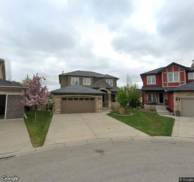 Street view of 47 Evercreek Bluffs Point SW, Calgary