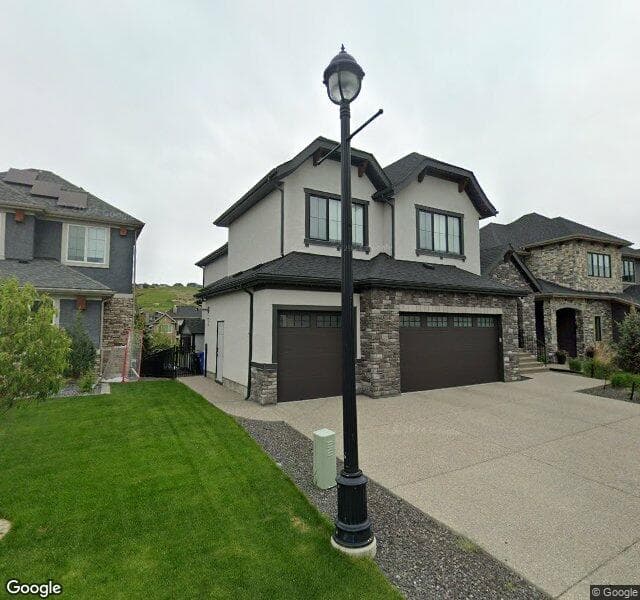 Street view of 230 Cranbrook View SE, Calgary