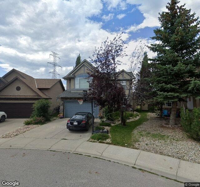 Street view of 62 Strathlea Crescent SW, Calgary