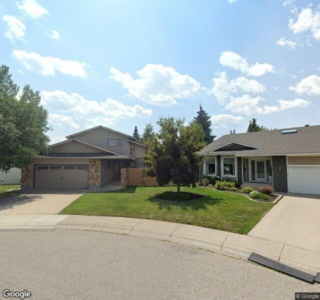 Street view of 19 Lake Bonaventure Place SE, Calgary