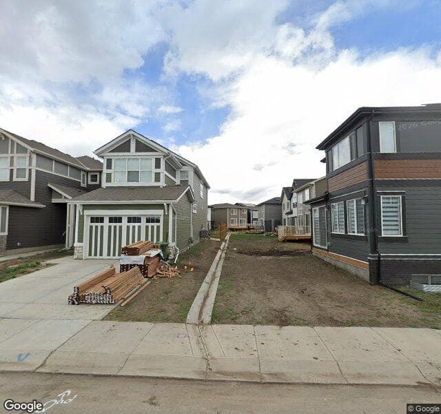 Street view of 69 Magnolia Path SE, Calgary