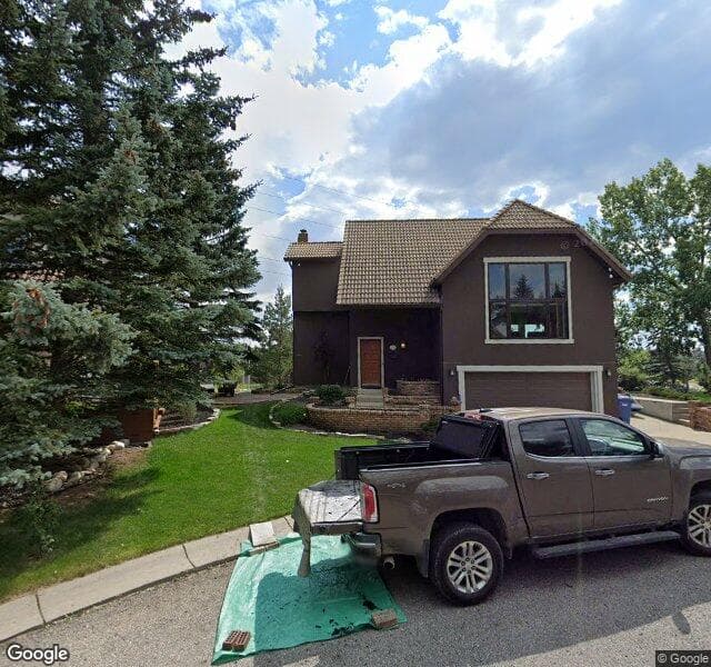 Street view of 535 Coach Light Bay SW, Calgary