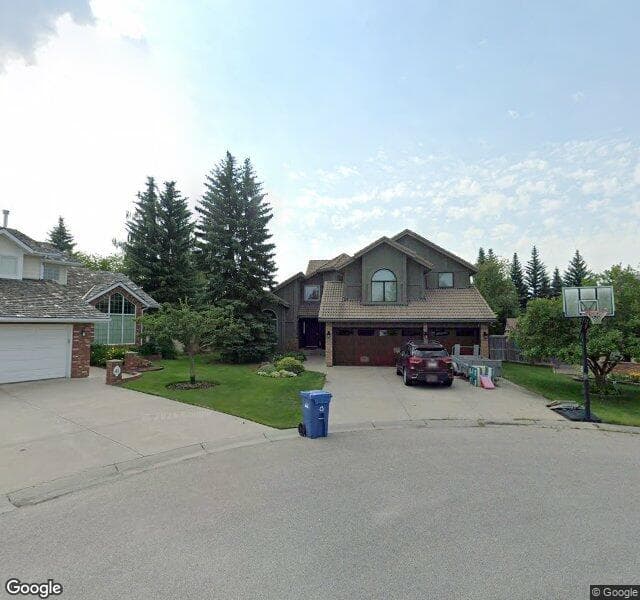 Street view of 45 Woodpath Terrace SW, Calgary