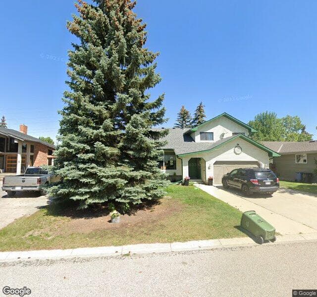 Street view of 68 Strathbury Circle SW, Calgary