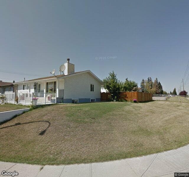 Street view of 6848 8 Avenue NE, Calgary