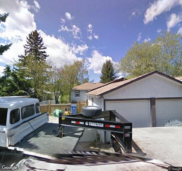 Street view of 4024 Grove Hill Road SW, Calgary