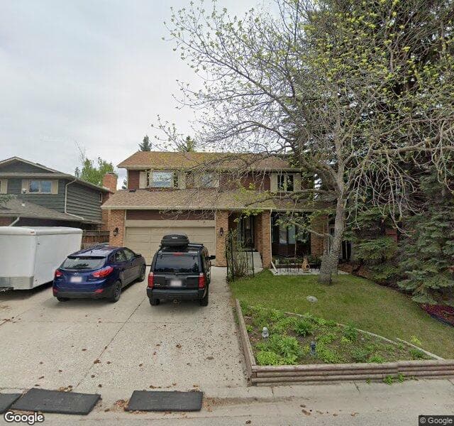 Street view of 52 Deerwood Road SE, Calgary