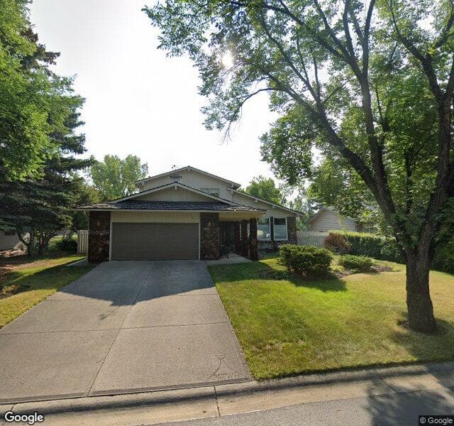 Street view of 739 Woodpark Road SW, Calgary